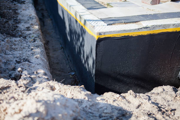 Professional Waterproofing technician working in Sumner, WA
